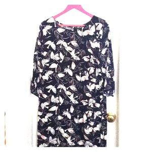 Blue long sleeved dress with dove pattern